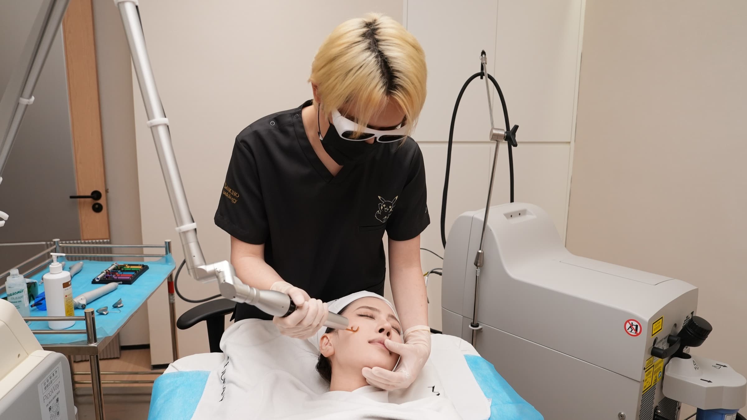 A laser treatment in progress, protective eyewear in place